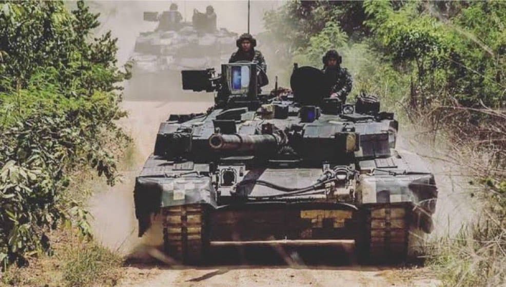 Military tanks advancing towards frontlines during Thailand-Cambodia b Military tanks advancing towards frontlines during Thailand-Cambodia b